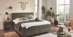 grünes Boxspringbett